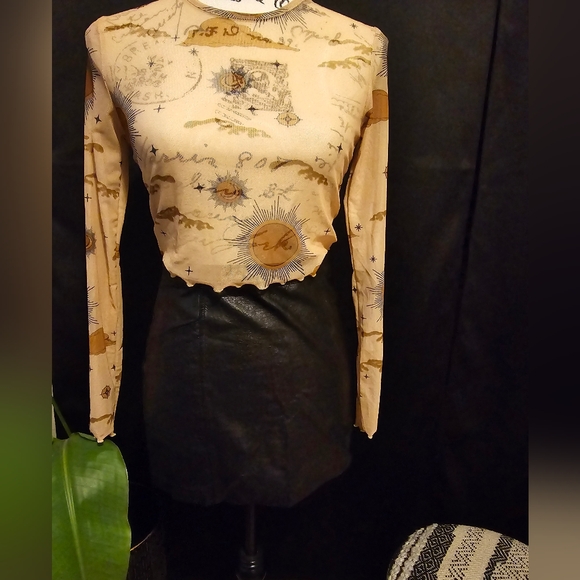 Sheer nudes color, crew neck crop top with ruffled edges on sleeves and torso. - Picture 7 of 7